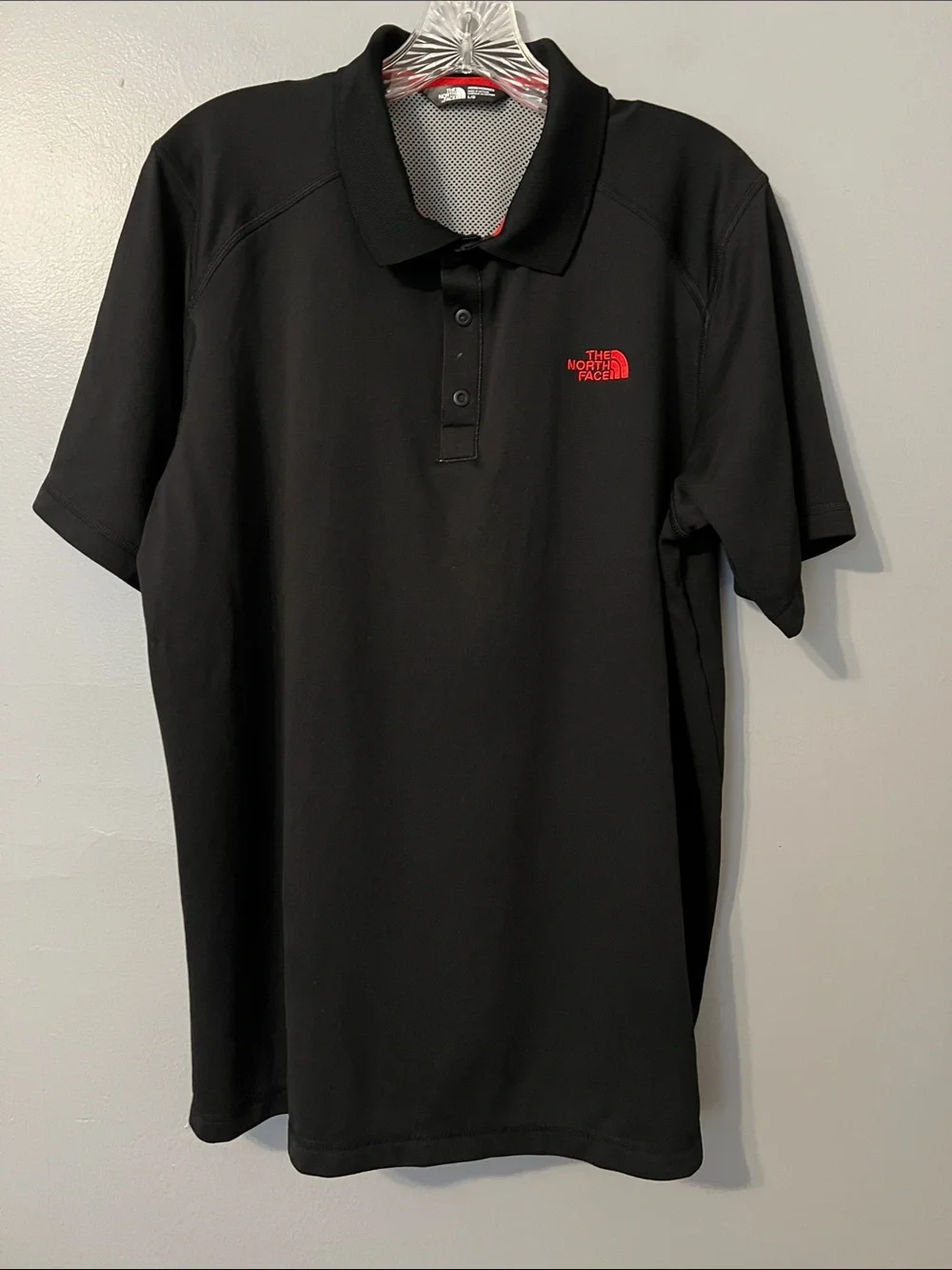The North Face Black Polo with Red Logo Accent